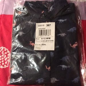 Brand new . Still in plastic button up shirt 👕